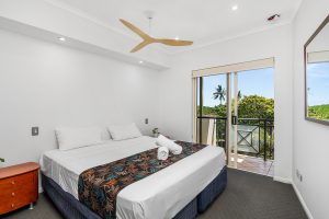 Bedroom with private balcony in 2 bedroom apartment in North Cove Cairns