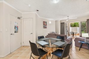 Dining area and Lounge room in 1 Bedroom Apartment Cairns